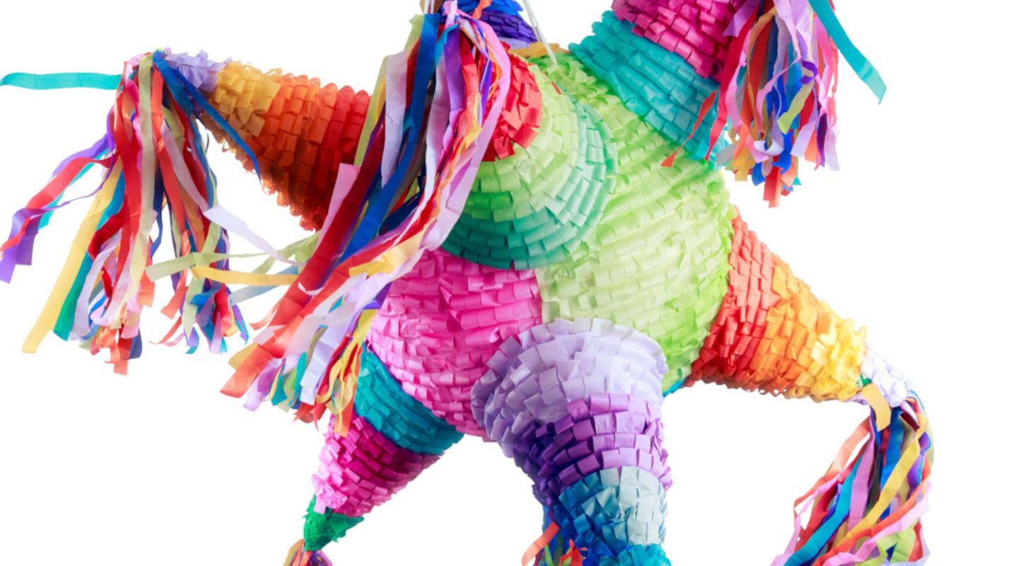 Colorful mexican pinata used in birthdays isolated on white