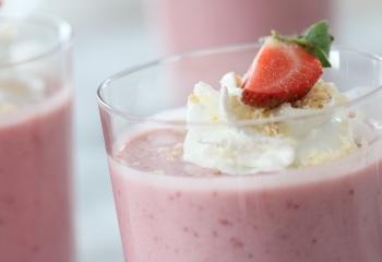 strawberry shortcake smoothies close up with whipped cream thumb e