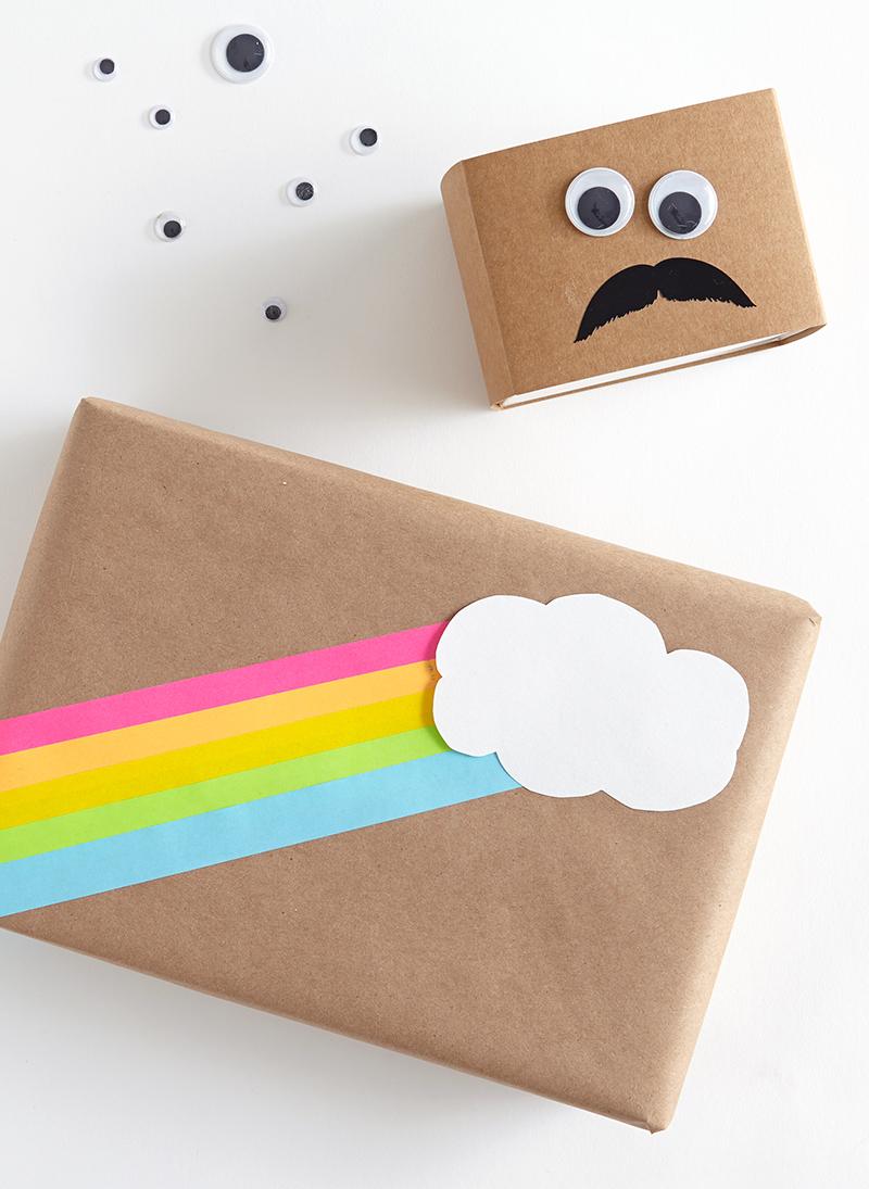 Rainbow cloud and googly eyed mustache face on Plain Brown Wrapping Paper