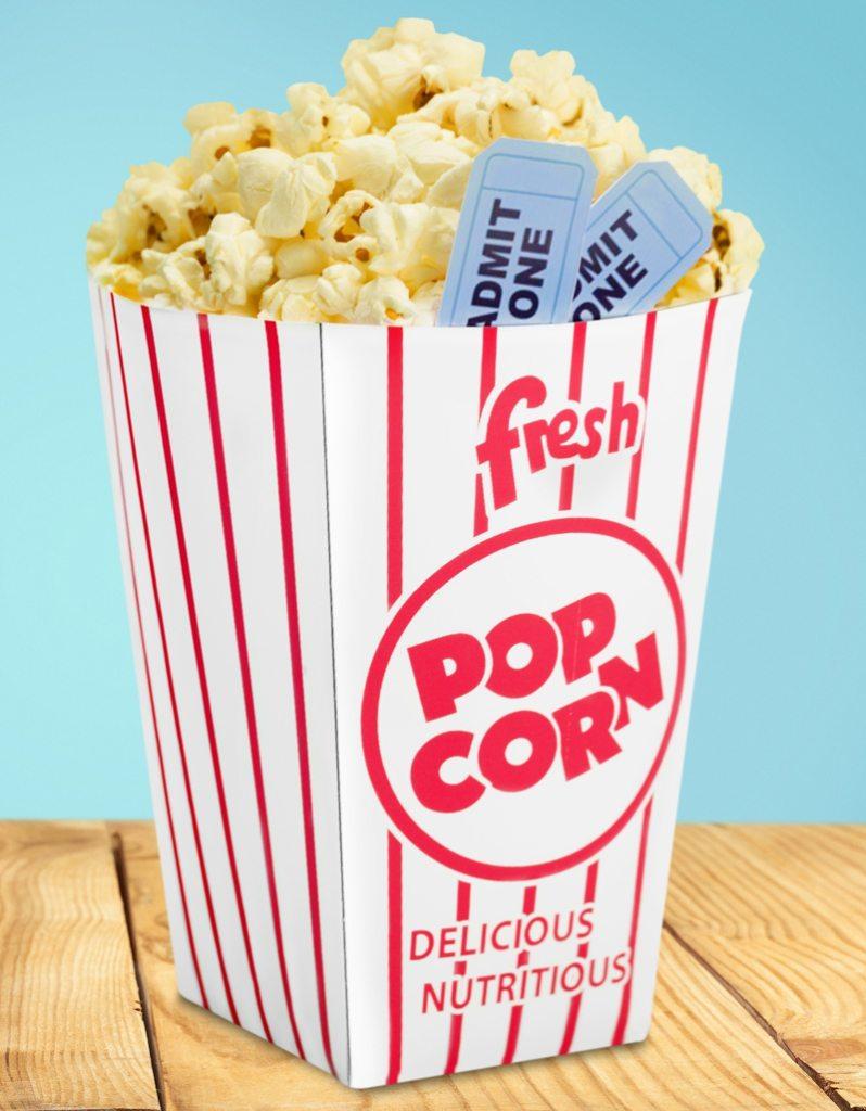 secret santa gift of movie night popcorn box and tickets