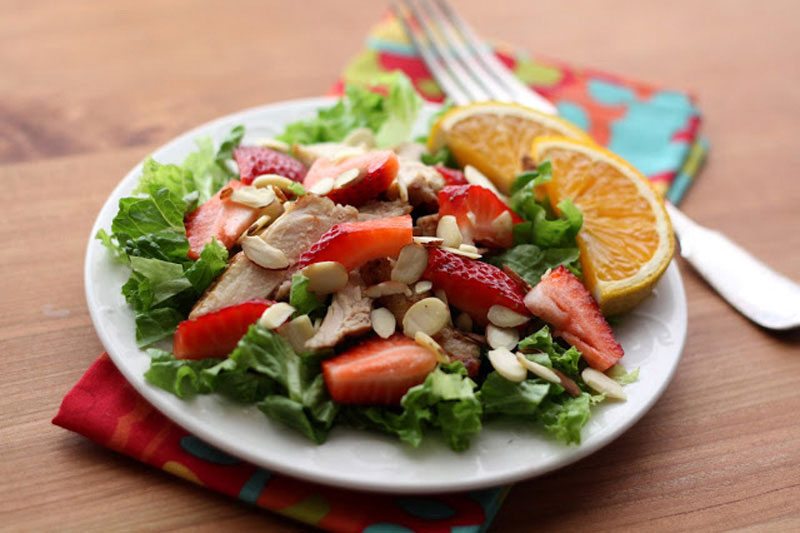 https://www.berries.com/blog/wp content/uploads///strawberry chicken salad with warm vinaigrette recipe