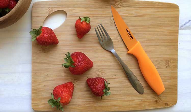 strawberries on cutting board