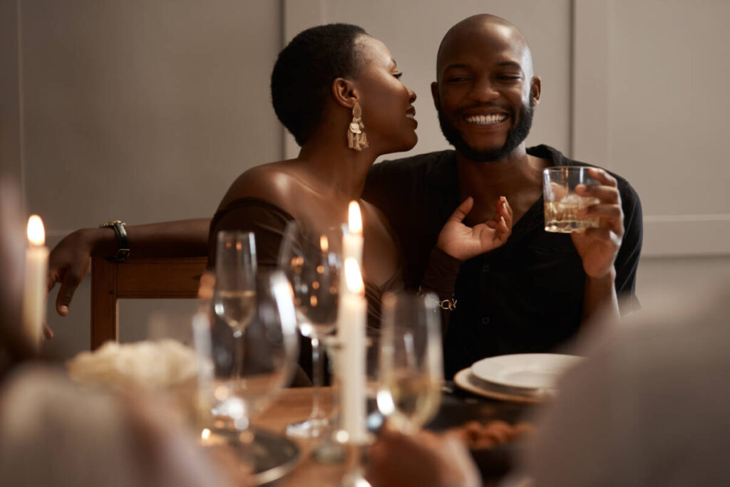 https://www.berries.com/blog/wp content/uploads///anniversary date ideas black couple happy at dinner x